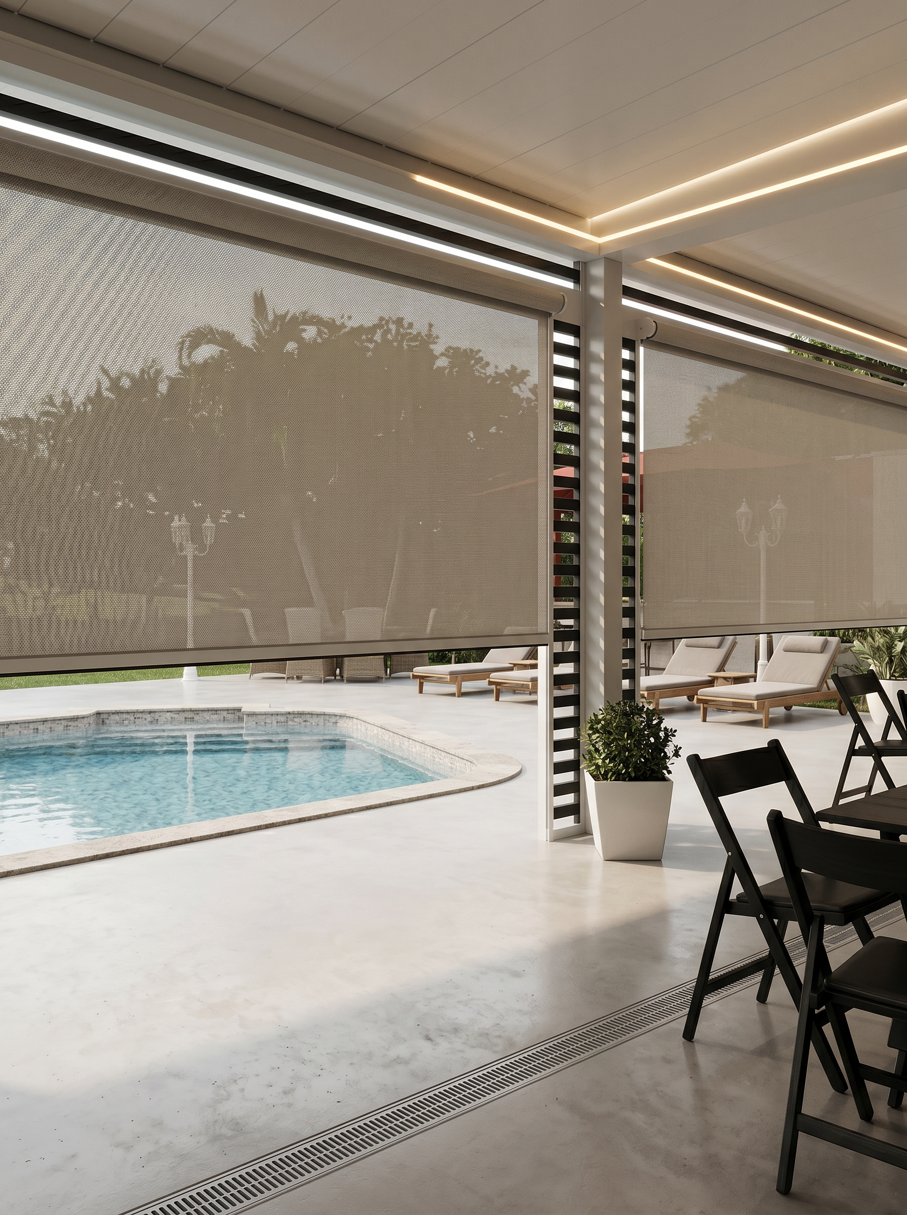 Covered patio featuring custom shades that provide solar protection and privacy while overlooking a backyard pool and outdoor seating area.